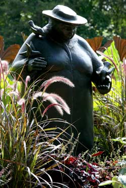 Woman with the Birds by Joe Ann Cousino